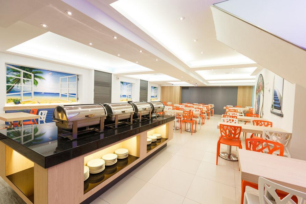 Wecan Hotel Каосюн Екстериор снимка