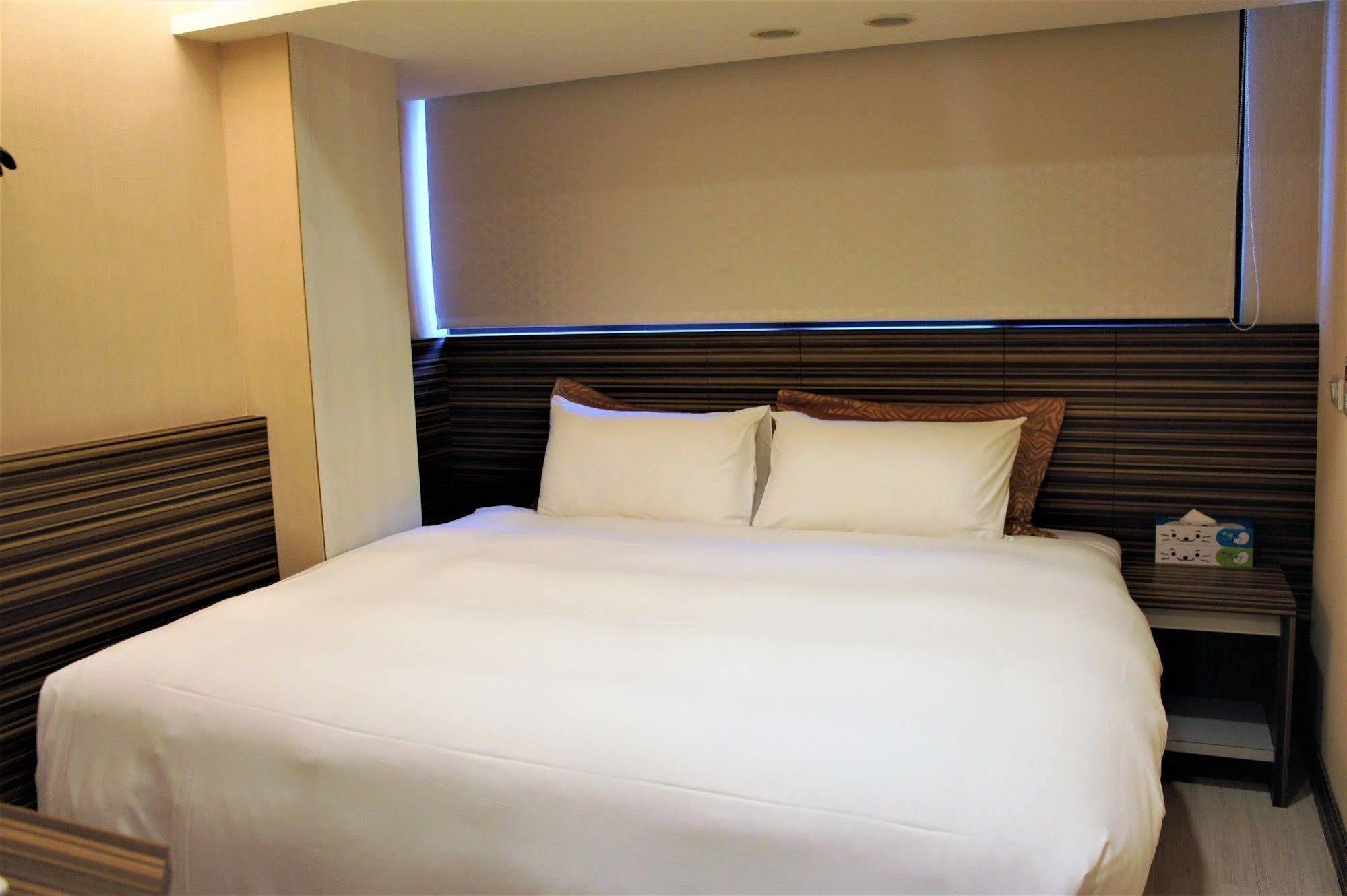 Wecan Hotel Каосюн Екстериор снимка