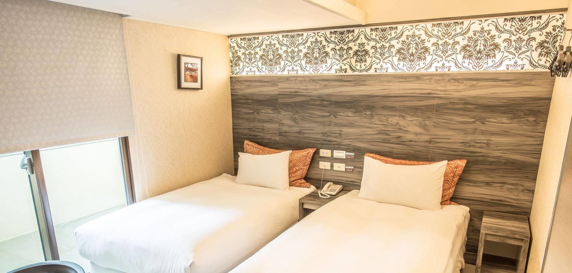 Wecan Hotel Каосюн Екстериор снимка