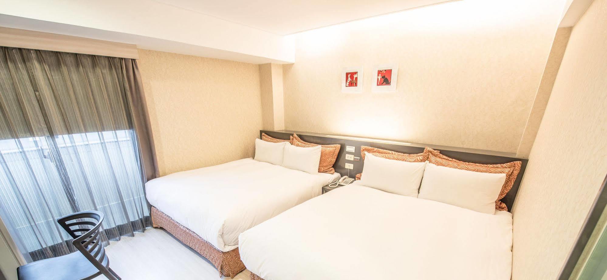 Wecan Hotel Каосюн Екстериор снимка